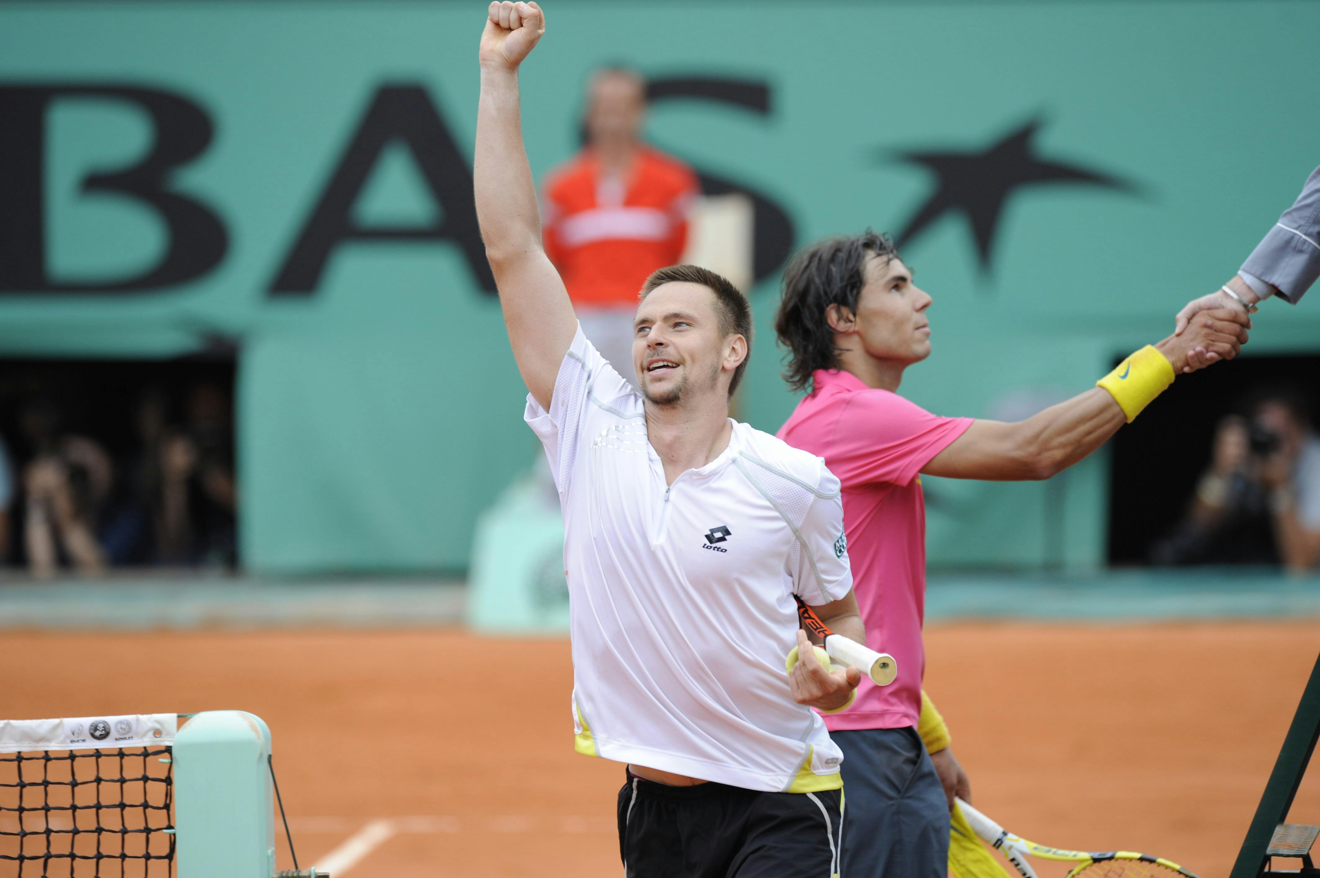 Robin Soderling celebrates his defeat of Rafael Nadal in the fourth round at Roland-Garros in 2009.