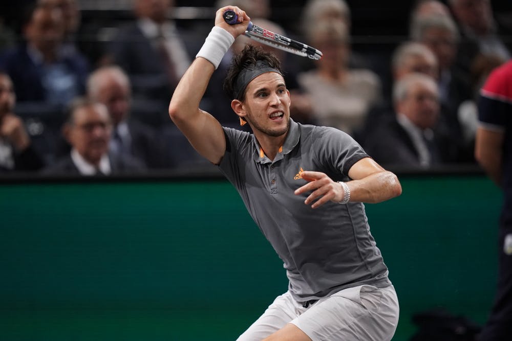 Dominic Thiem hitting a forehand during the Rolex Paris Masters 2019