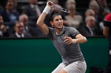 Dominic Thiem hitting a forehand during the Rolex Paris Masters 2019