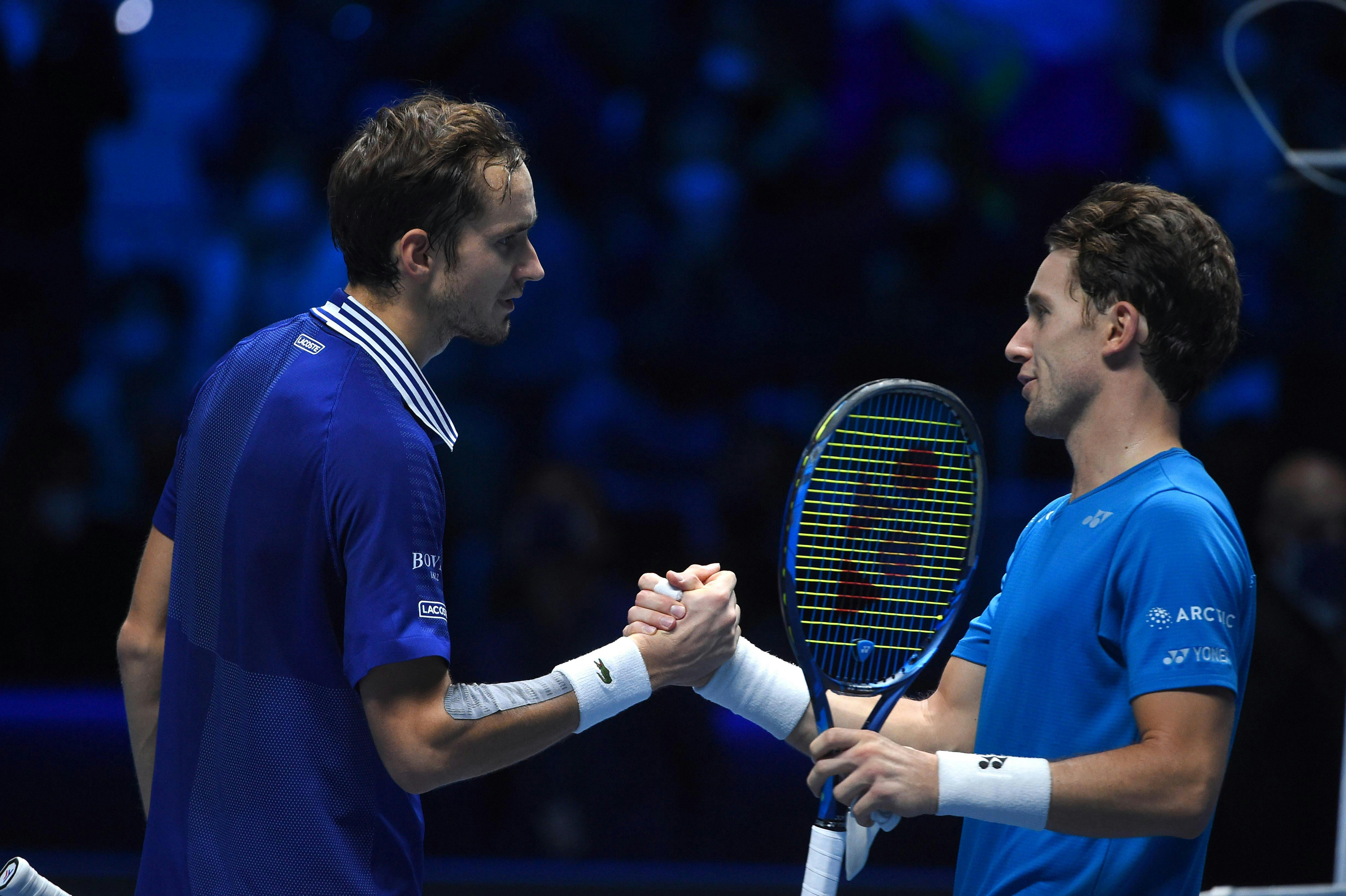 Daniil Medvedev and Casper Ruud at the net after their semifinal at the 2021 ATP Finals