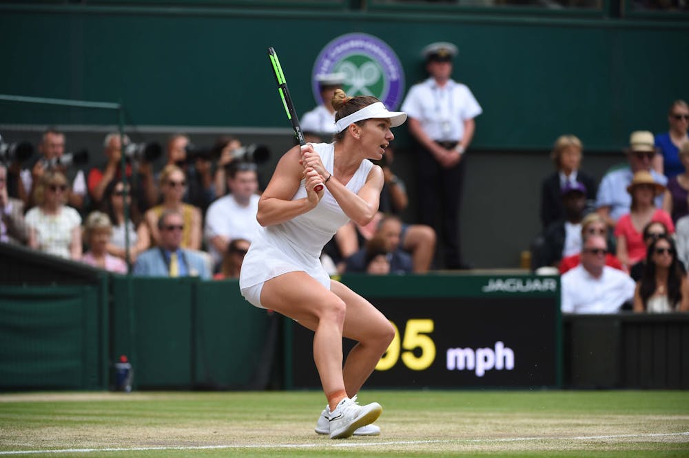 Simona Halep hitting a backhand during her Wimbledon 2019 final