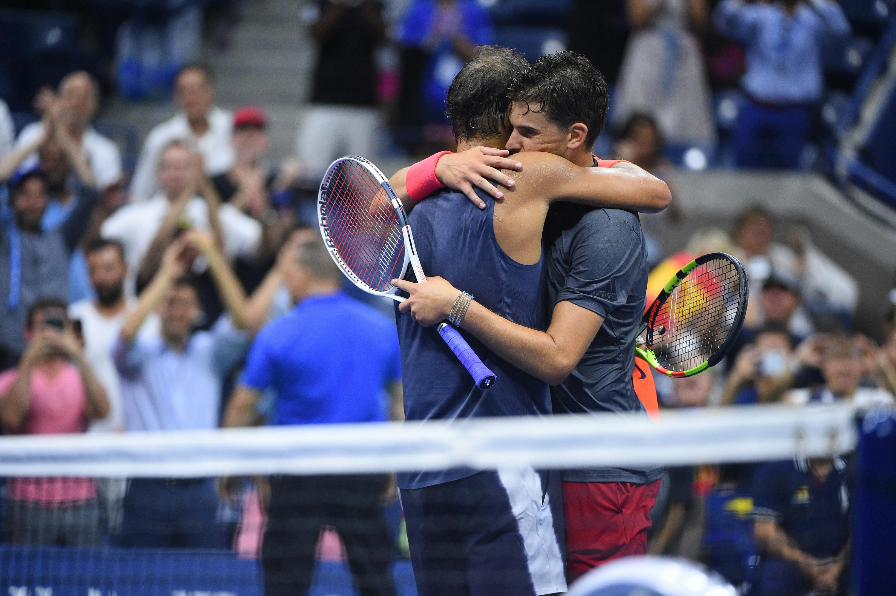 Rafael Nadal and Dominic Thiem hugging at the 2018 US Open