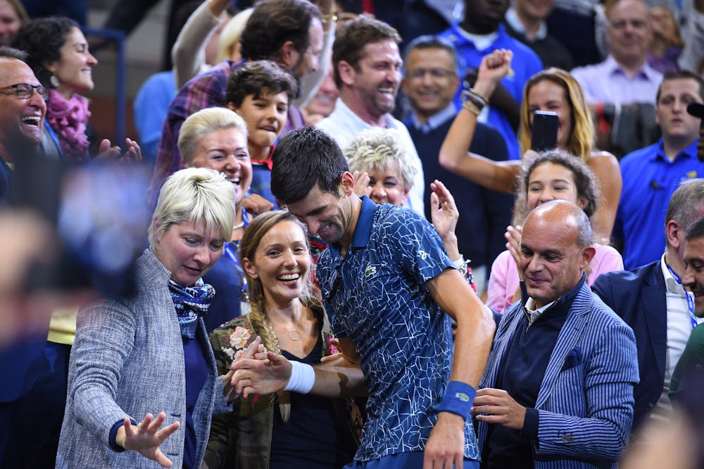 Novak Djokovic climbing in his box after the 2018 US Open final