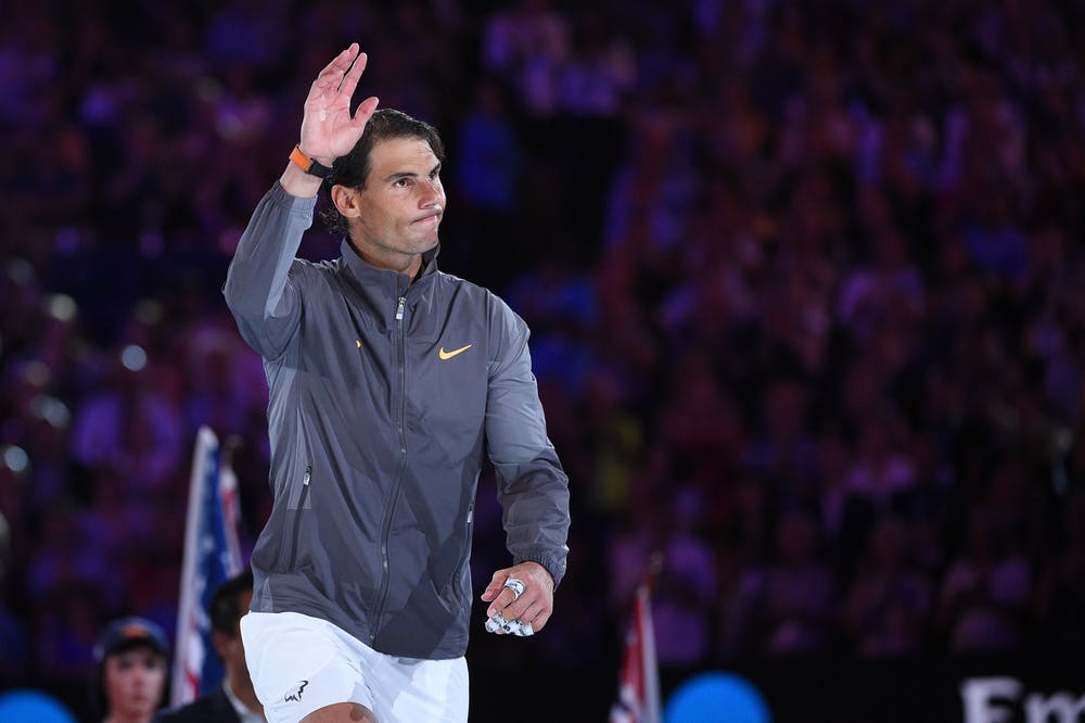 Rafael Nadal glimbing on the podium at the Australian Open 2019