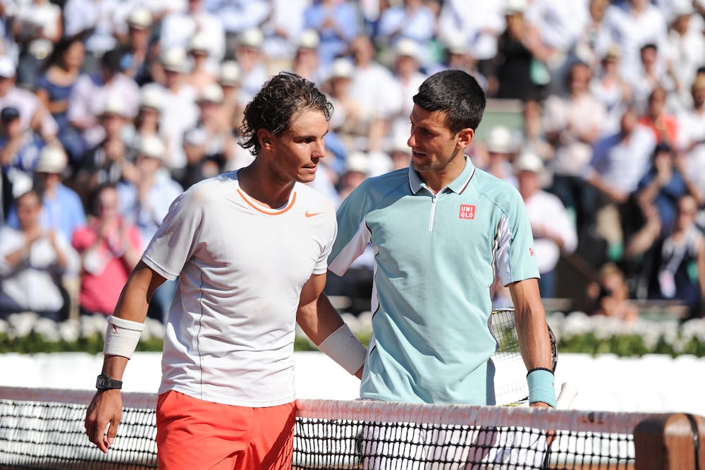 Rafael Nadal & Novak Djokovic after their semi-final at Roland-Garros 2013