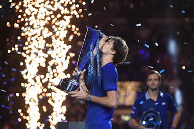 Alexander Zverev kissing his 2021 ATP Finals trophy