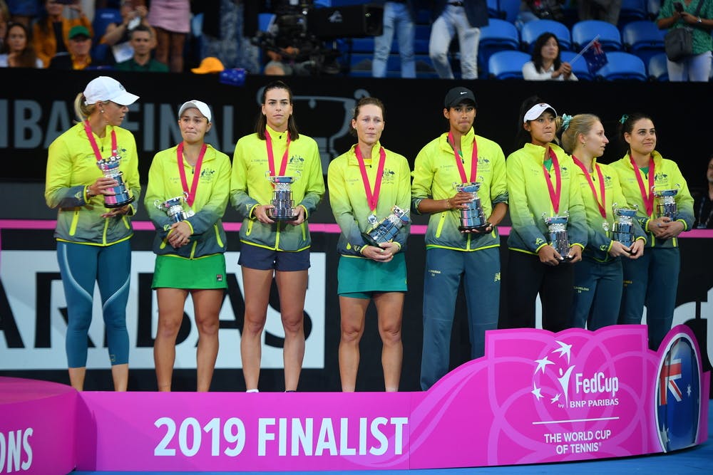 Ashleigh Barty crying in the middle of the Australian team at the 2019 Fed Cup final