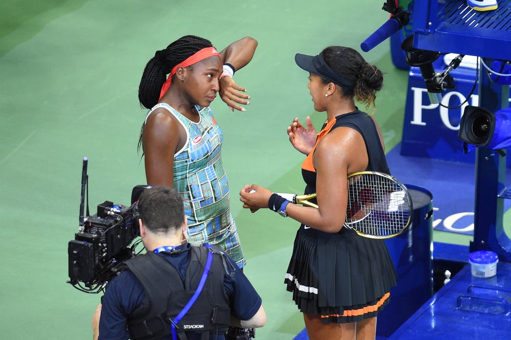 Naomi Osaka comforting Cori Gauff during the 2019 US Open