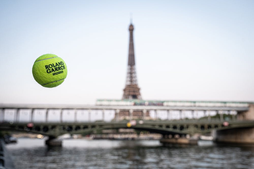 The 2020 Roland-Garros tennis ball in front of the Eiffel Tower