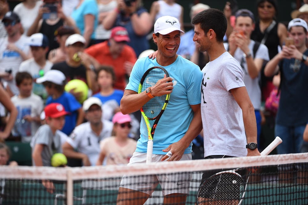 Rafael Nadal and Novak Djokovic laughing during Roland-Garros 2019