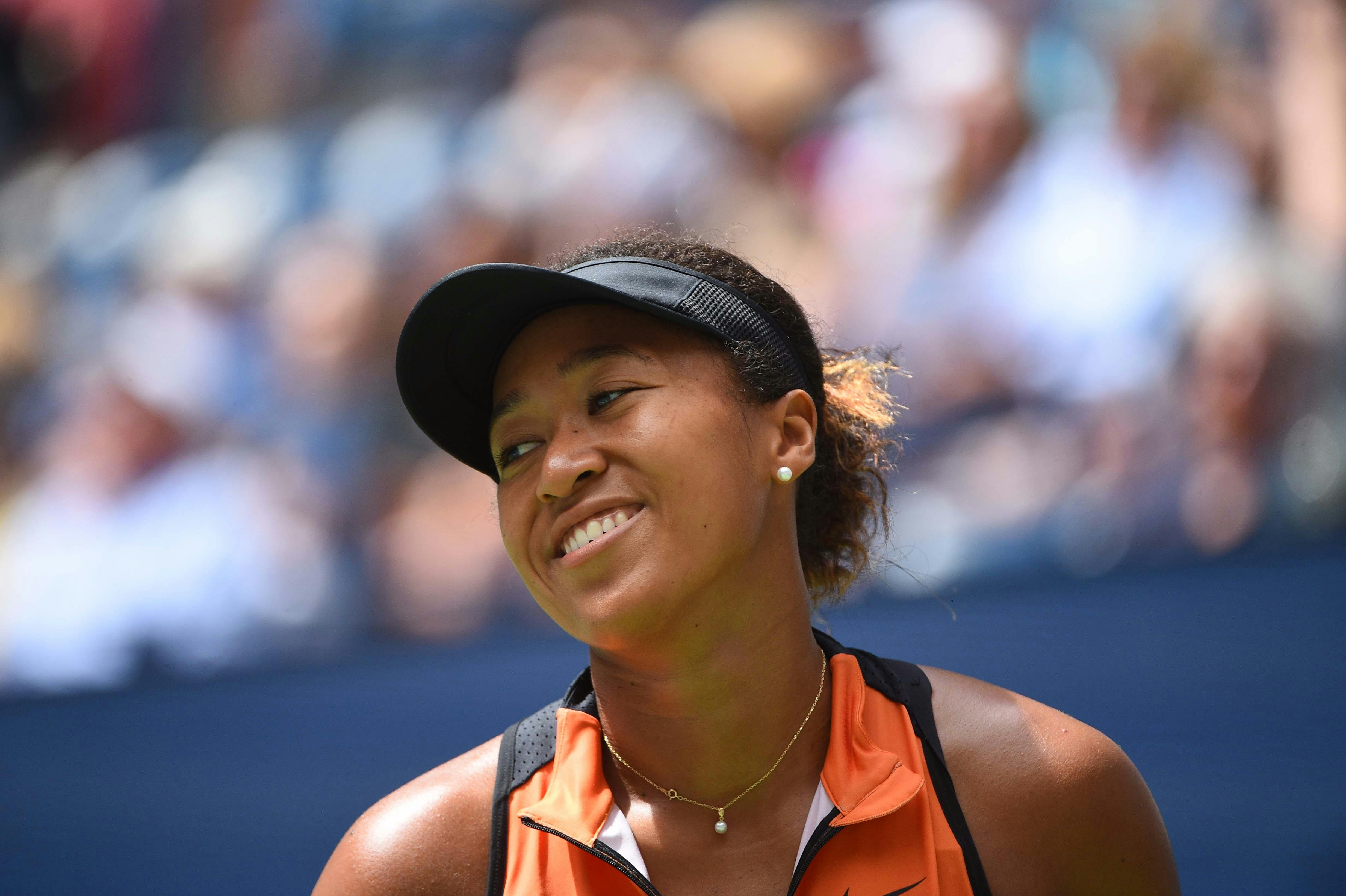 Naomi Osaka smiles during the 2019 US Open