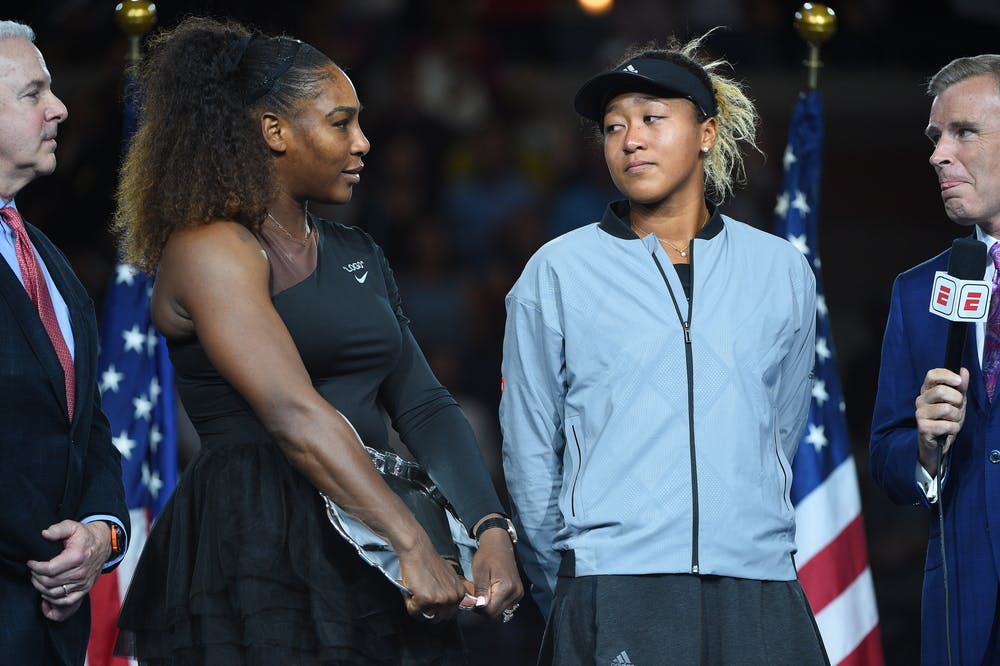Serena Williams and Naomi Osaka both looking sad during the trophy presentation at the 2018 US Open.