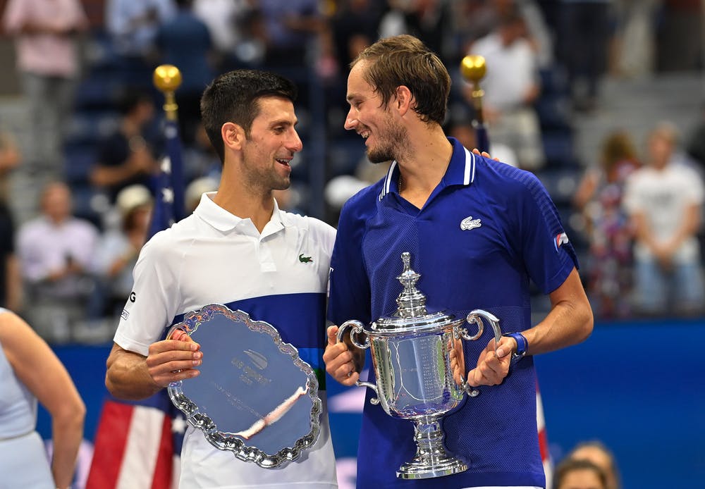 Novak Djokovic and Daniil Medvedev friendly chatting during the on court ceremony at the 2021 US Open.