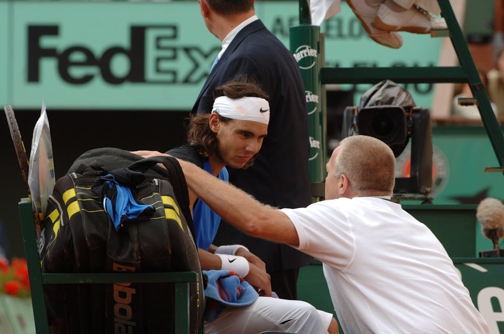 Rafael Nadal with the doctor during his match against Paul-Henri Mathieu 