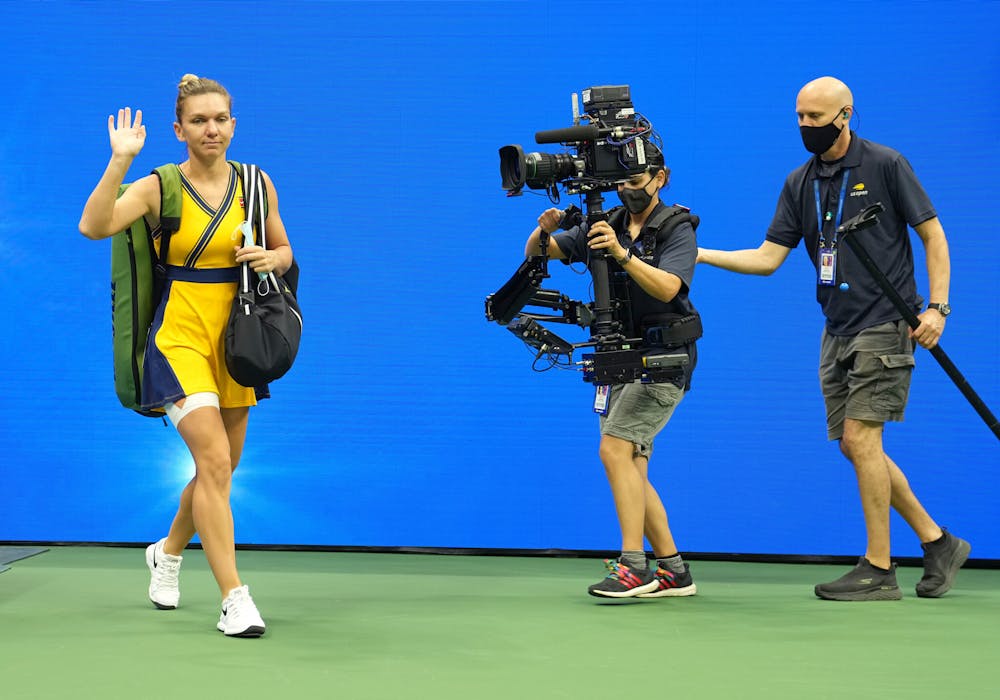 Simona Halep entering the court ahead of a match at the 2021 US Open.