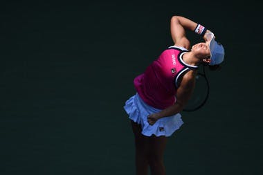 Ashleigh Barty serving in the light during her third round match at the 2019 US Open
