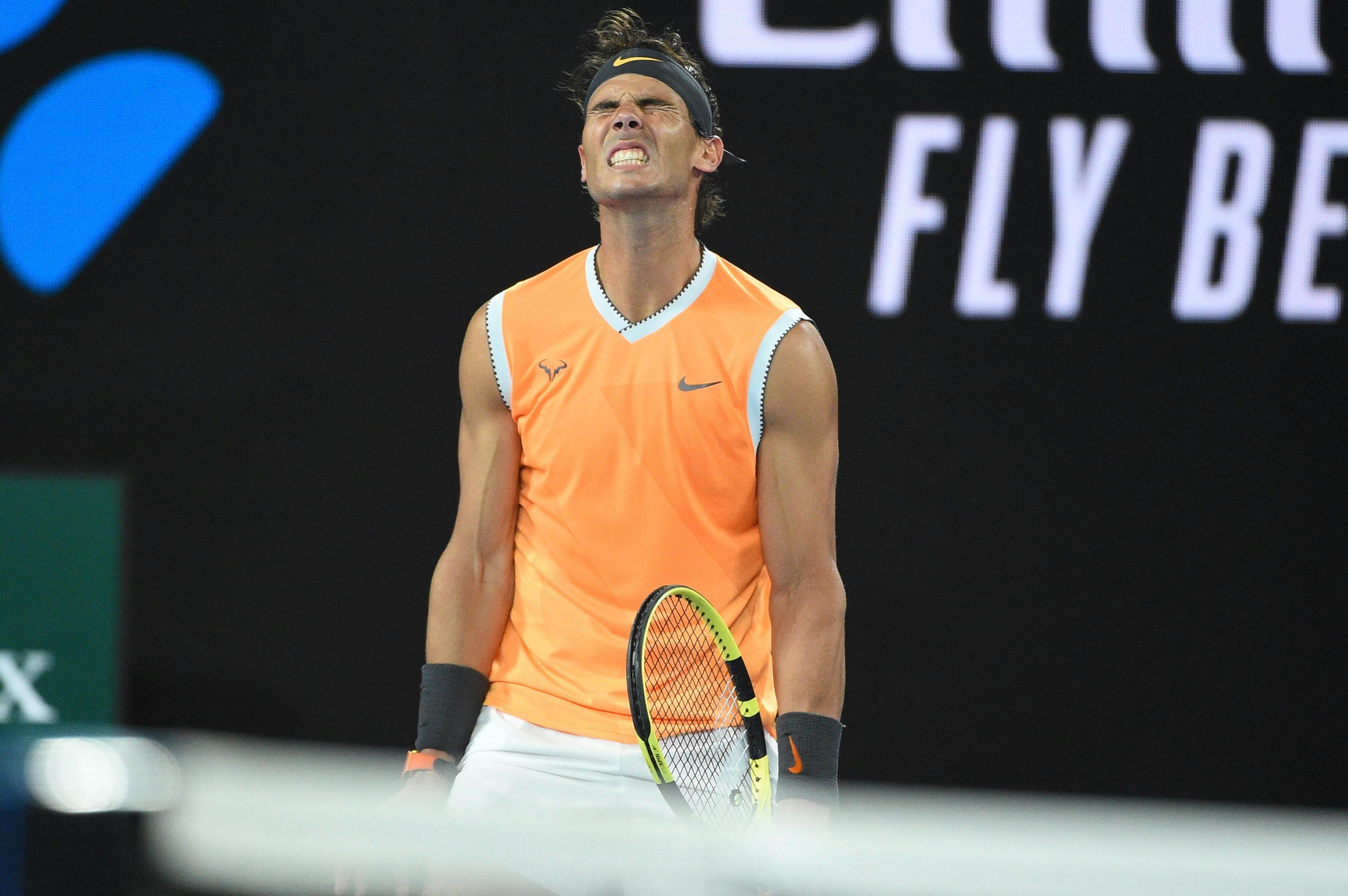 Rafael Nadal misses a ball at the 2019 Australian Open