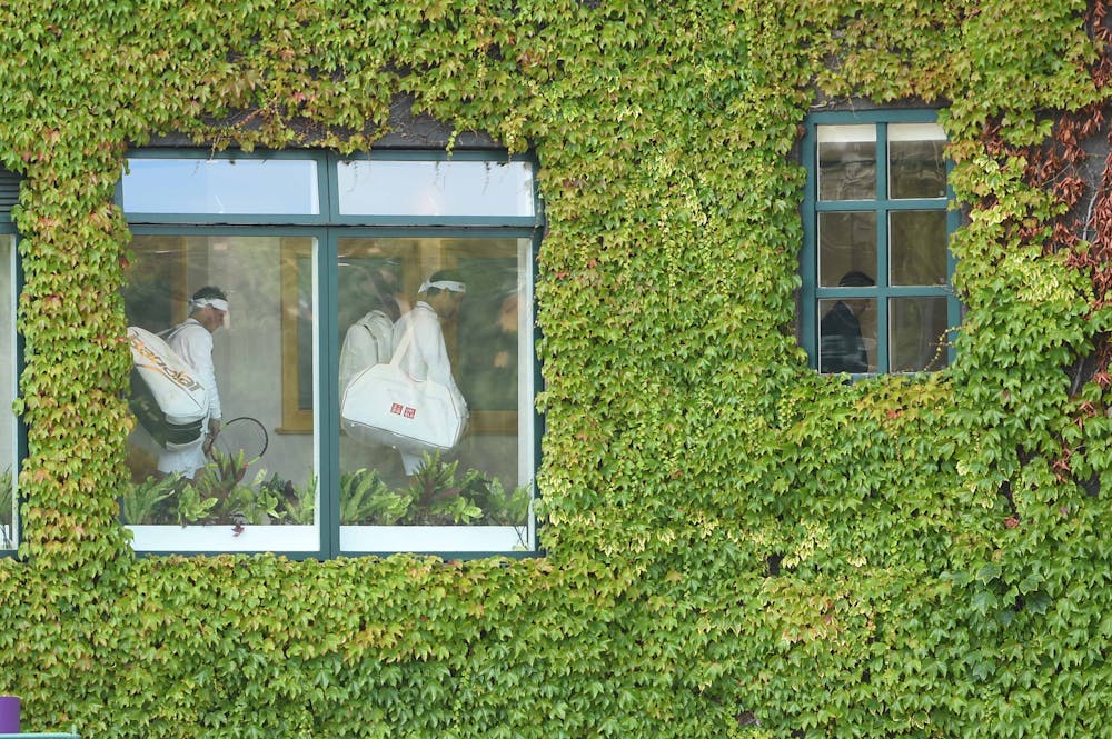 Roger Federer and Rafael Nadal through the window of the Centre Court at Wimbledon 2019