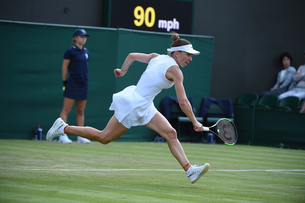 Simona Halep running for a ball at Wimbledon 2019