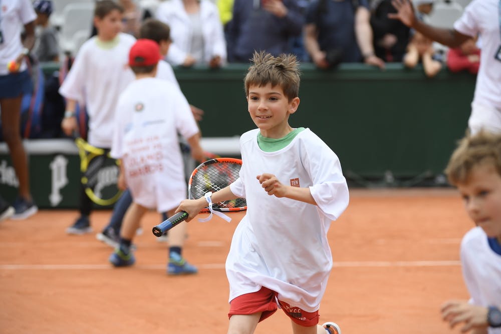 Children hit the courts for Kids Day at Roland-Garros.