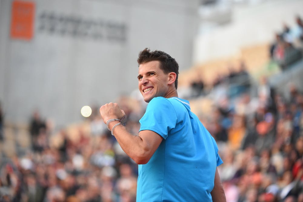 Dominic Thiem smiling and fist pumping looking at his box during Roland-Garros 2019