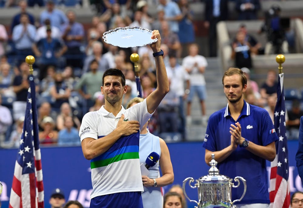 Novak Djokovic holding the finalist's trophy at the 2021 US Open