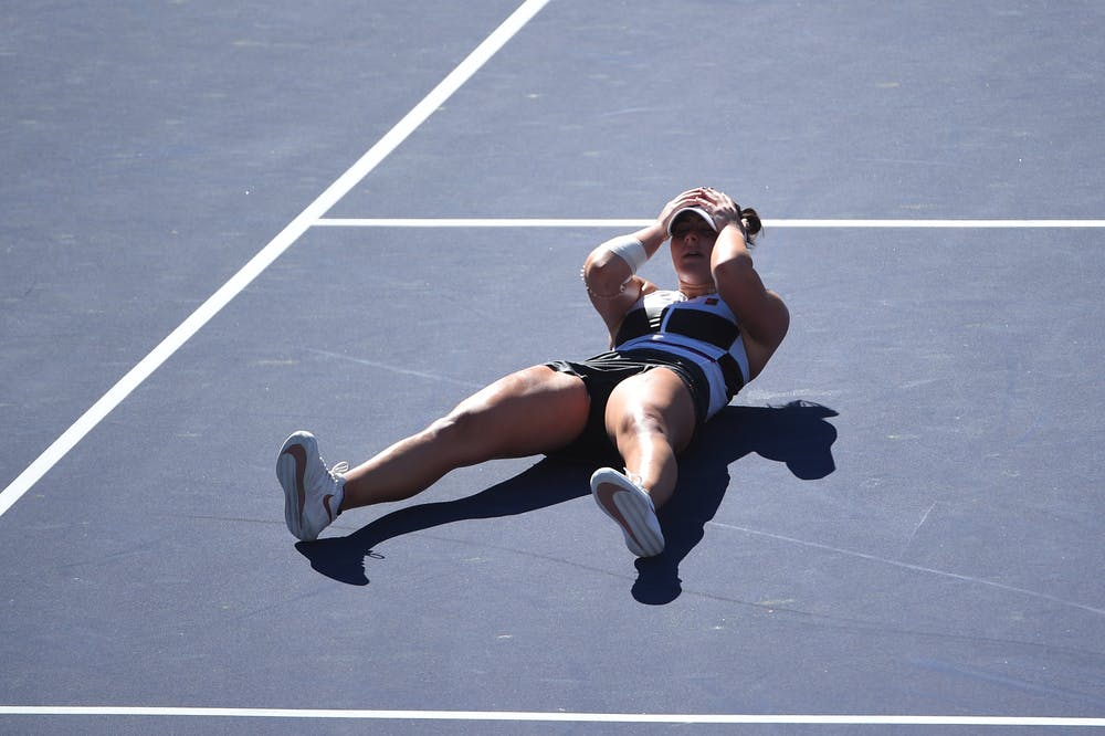 Bianca Andreescu lying on the ground after match point in the final of Indian Wells 2019