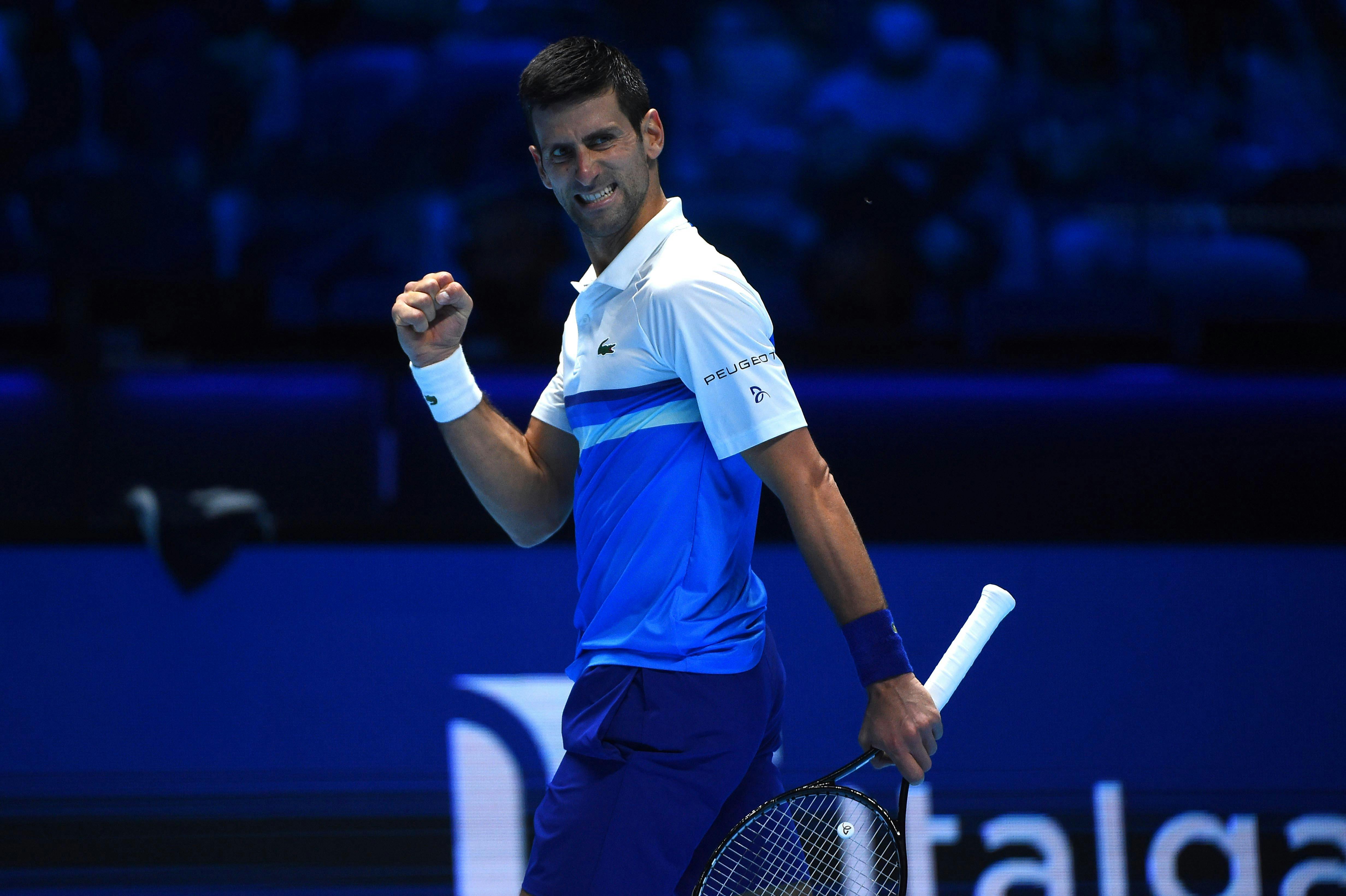Novak Djokovic fist pumping as he qualifies for the semis at the 2021 ATP Finals
