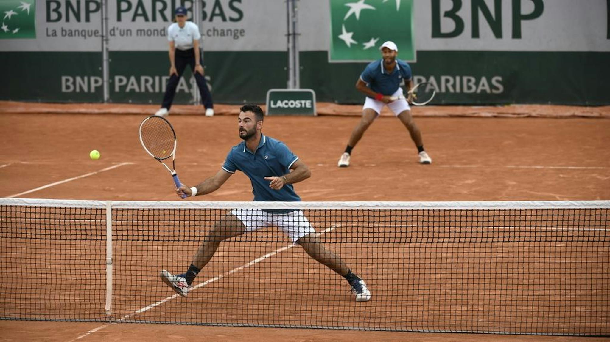 Fabien Reboul à la volée et Sadio Doumbia au fond, lors du dernier Roland-Garros.