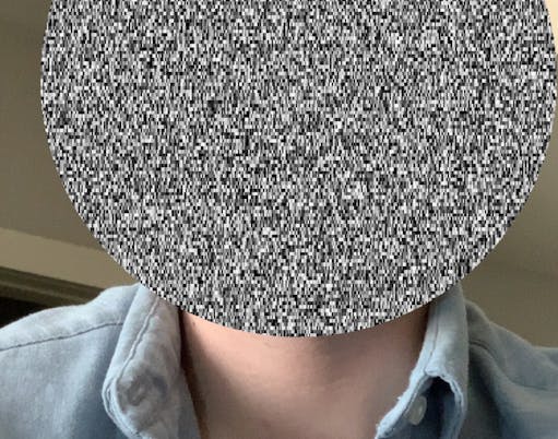 Man with head blurred out by static