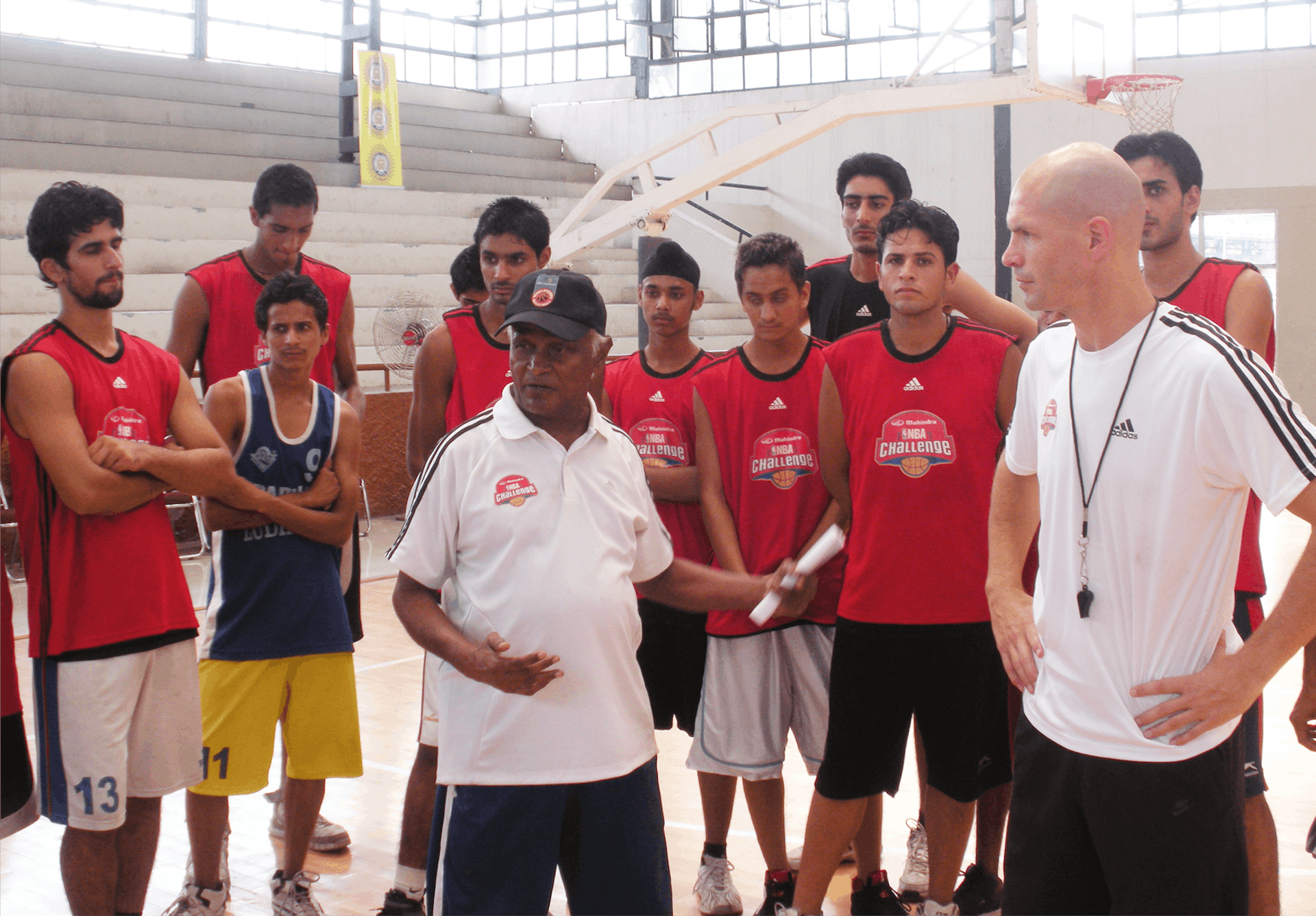 Subramanian (centre, with cap) speaking to a group of players at the LBA. Picture Credit : Karan Madhok
