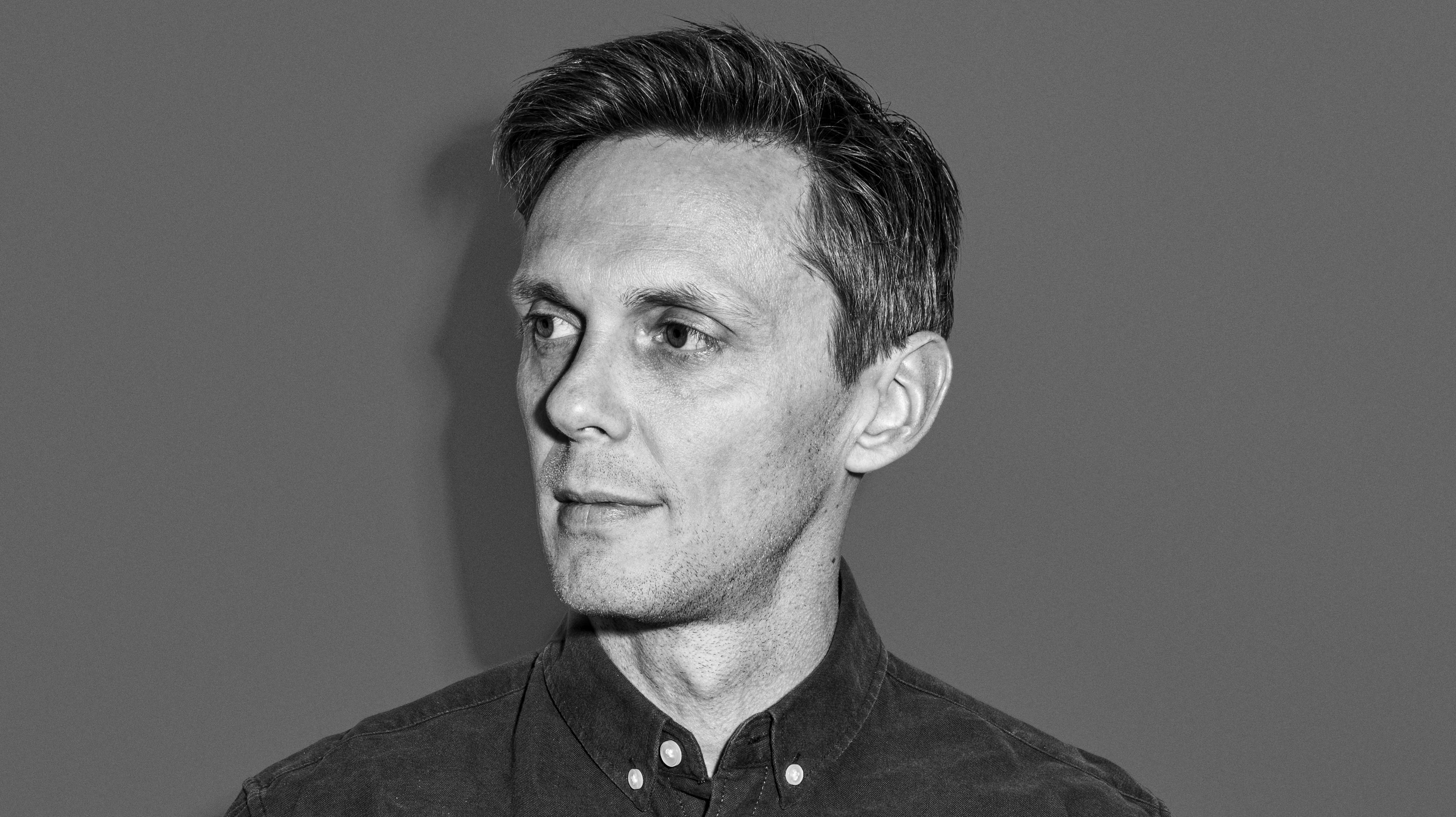 A portrait of a man in the style of photography used for this brand.