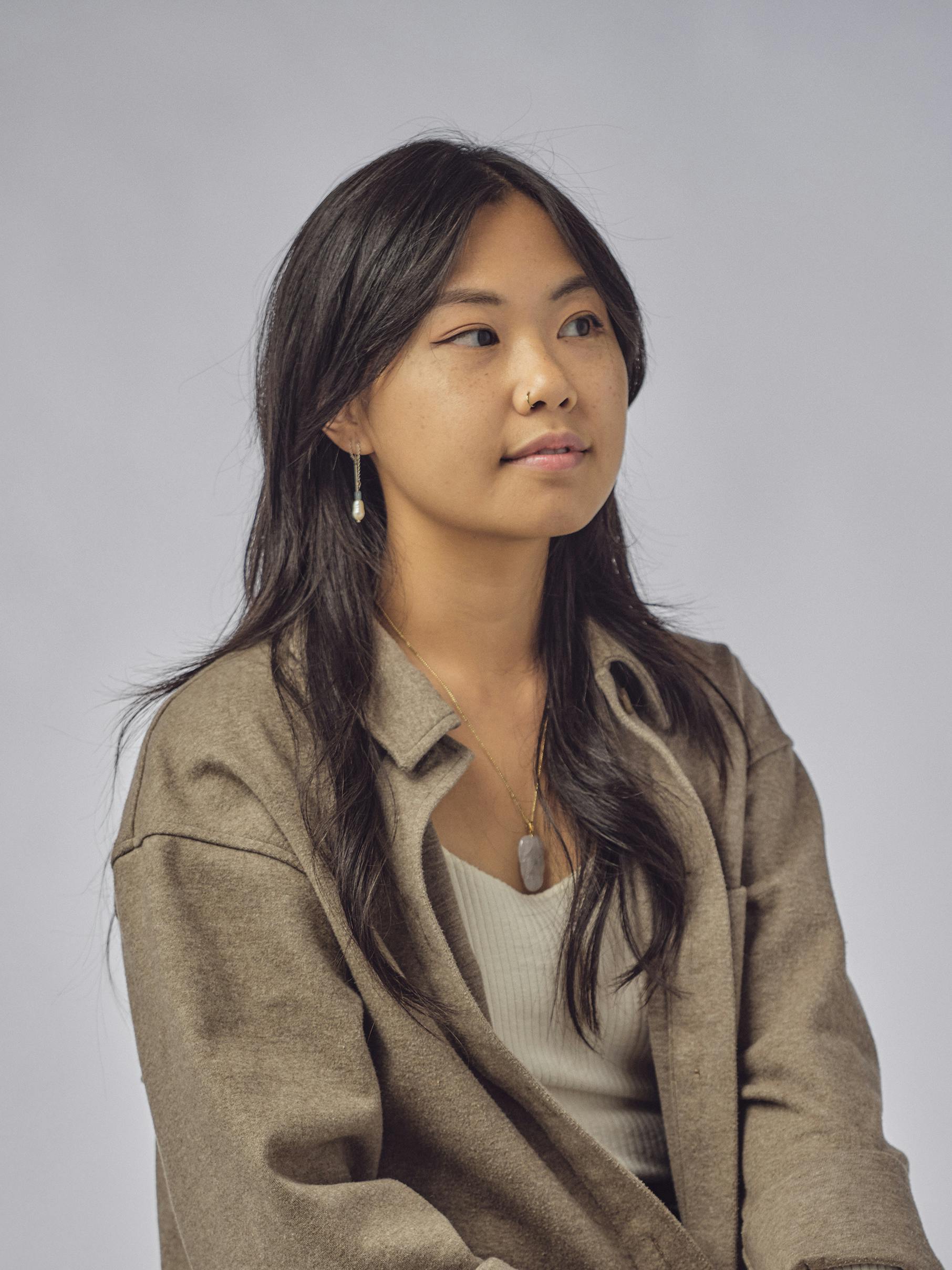 Studio portrait of Esther Ly.