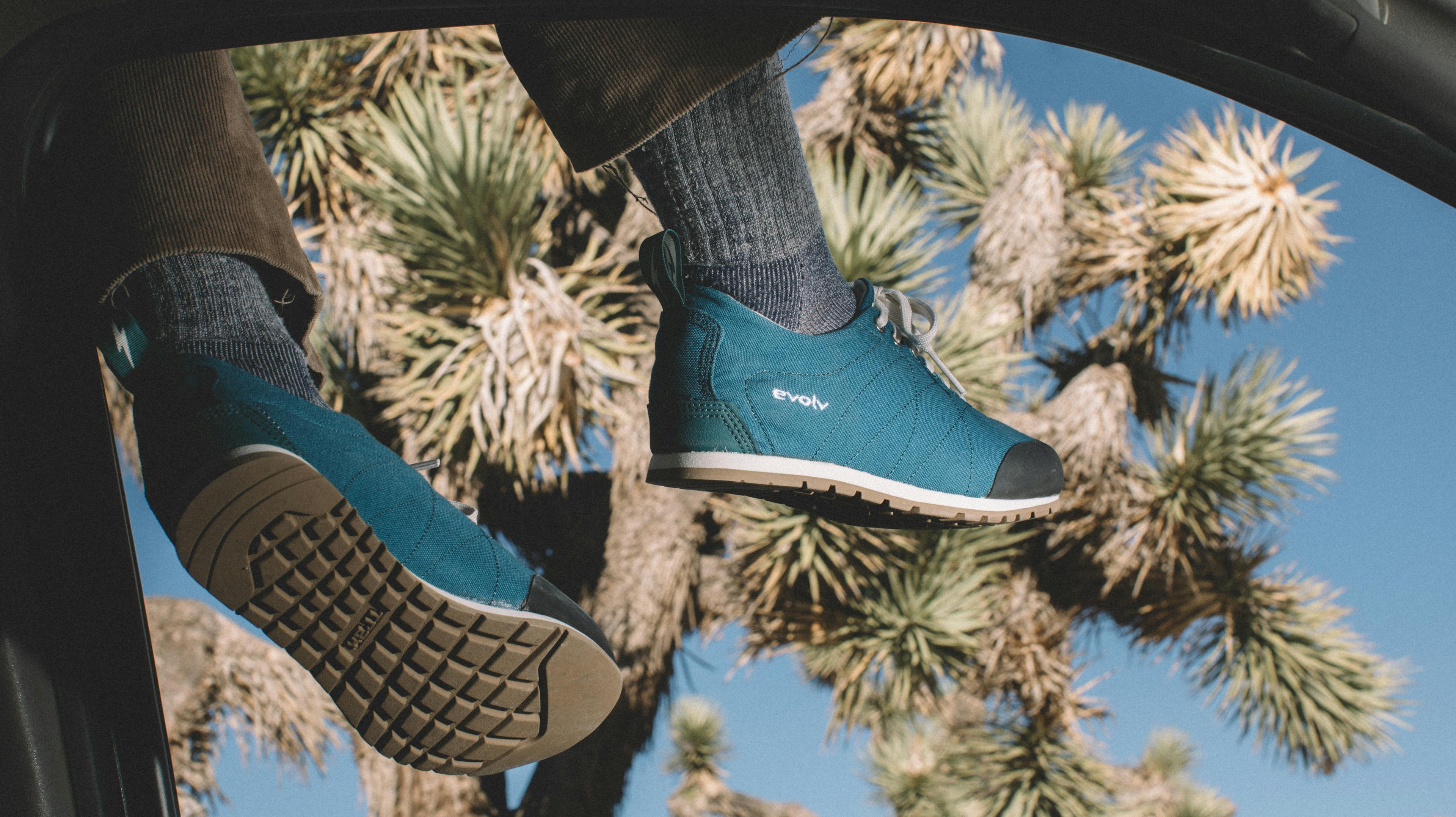 A pair of Evolv shoes shot overtop an environment in Southern California.