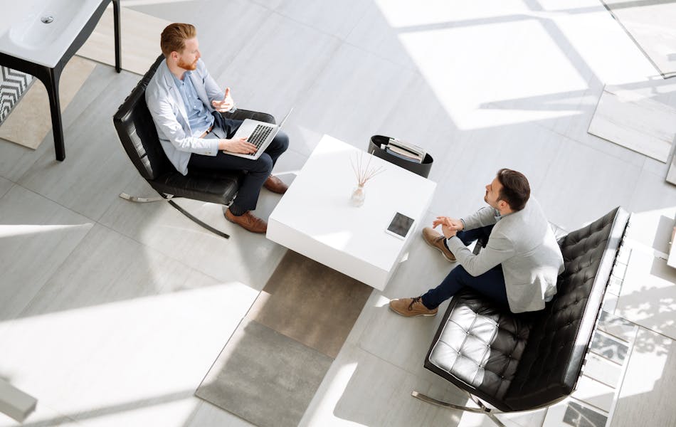 Two people in a meeting