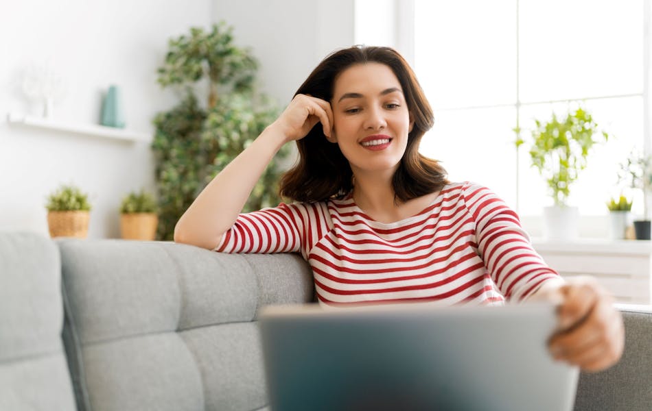 woman looking at a laptop