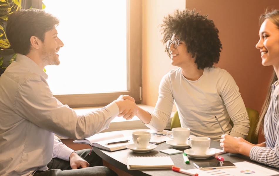 Man and woman shaking hands