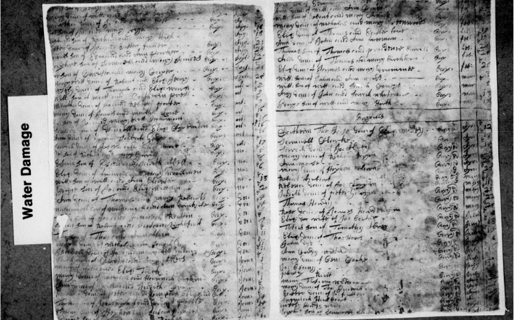 A water damaged page in the new Norfolk Baptisms additions.