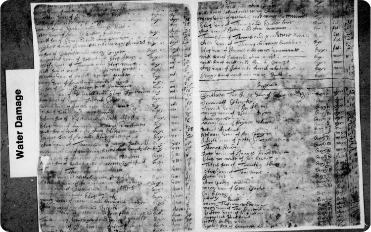 A water damaged page in the new Norfolk Baptisms additions.