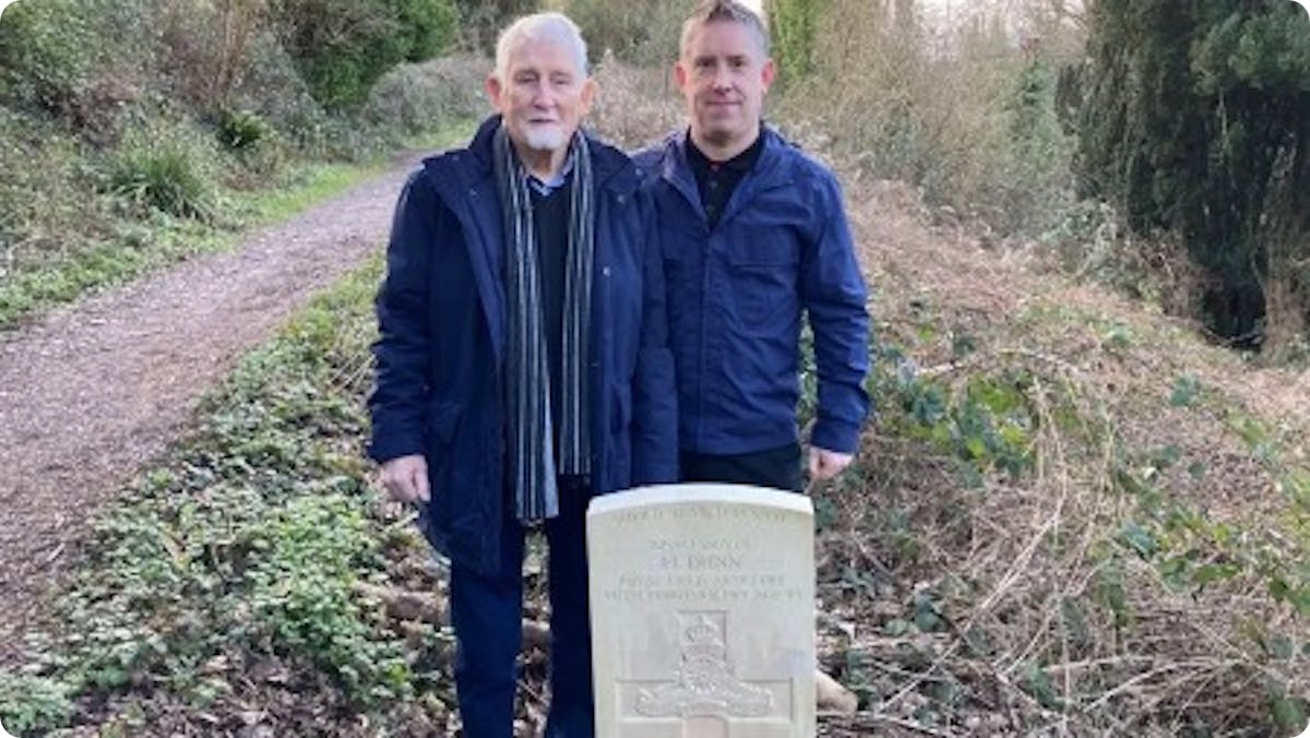 Harry’s relatives Reg and Andrew Keepin at the new grave.
