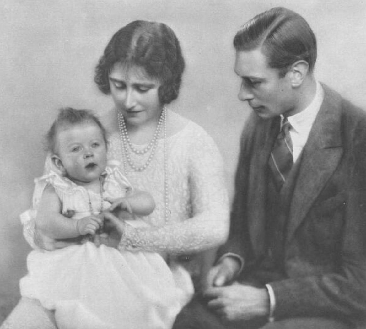 Princess Elizabeth with her parents, the Duke and Duchess of York, pictured in The Sketch, 22 December 1926.