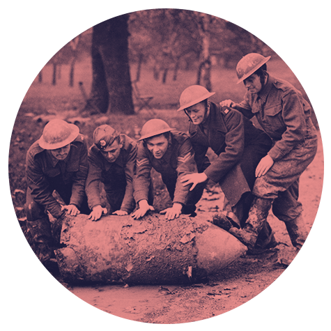 World War 2 soldiers with a bomb shell