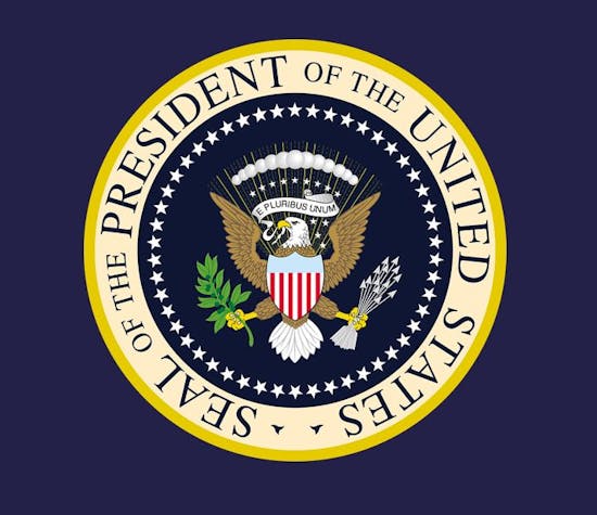 The presidential seal of the United States on an indigo background