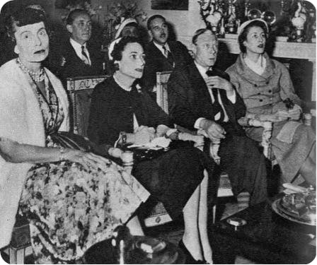 The Duke and Duchess of Windsor watch the coronation of Queen Elizabeth II. The Sphere, 13 June 1953.