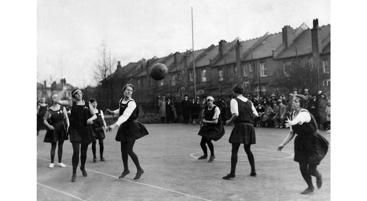 Old photo of girls playing netball