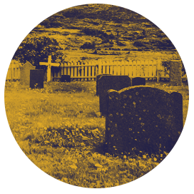 An old headstone in a graveyard