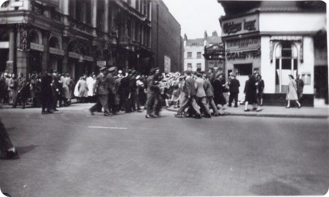 Dancing in Leicester Square, VE Day, 1945.