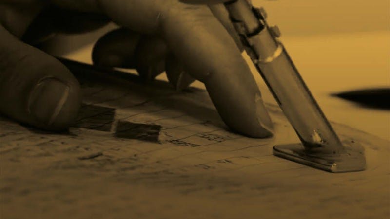 Photo of the hand of someone examining the 1939 register