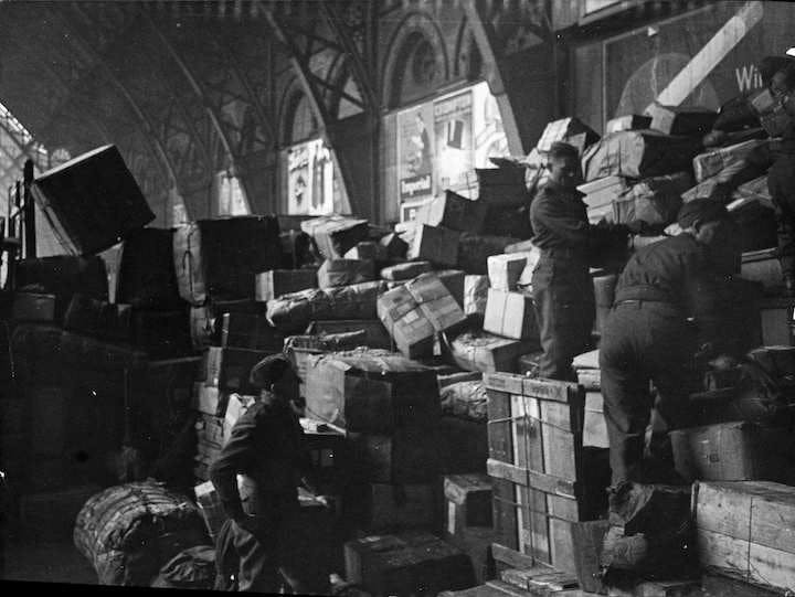 Christmas parcels at St Pancras station, 19 December 1943. Findmypast photo archive.