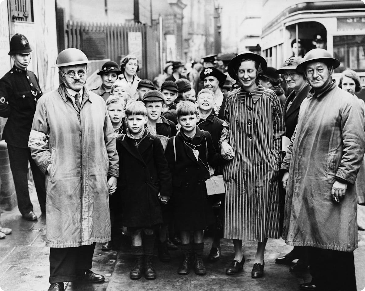 Wardens guide children in an evacuation drill in Birmingham, 1942.